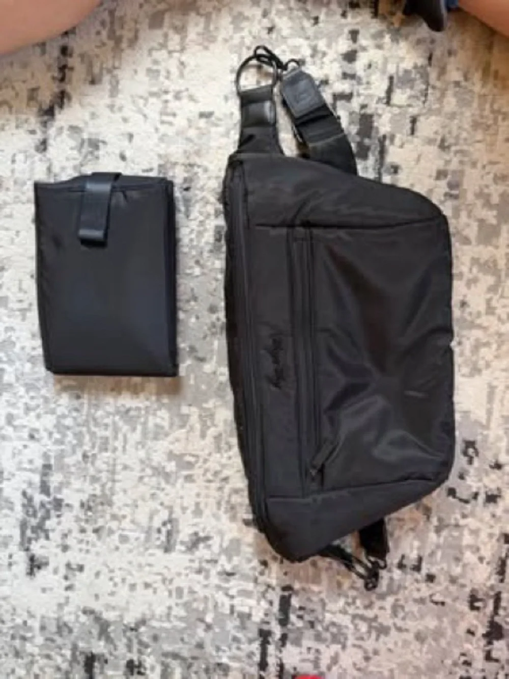 Black women’s ITZY RITZY Diaper Crossbody Sling Bag - Compact Everyday Carry